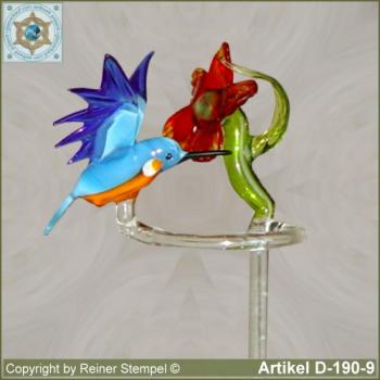Flowers rods, orchids rods, flowers holders made ??of glass with glass flower red and glass bird Kingfisher flying